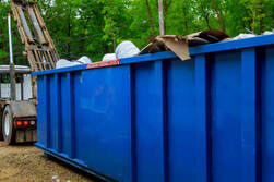 dumpster pictured at a business site